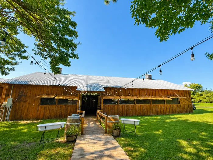 The dance hall from the lawn, strung with lights