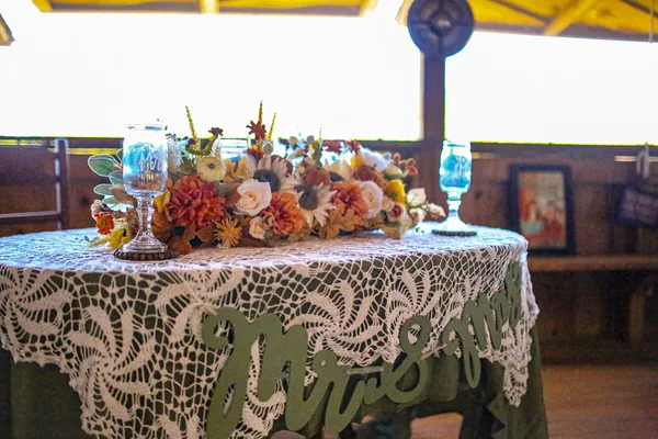 Bouquet, shoes, and the guest book