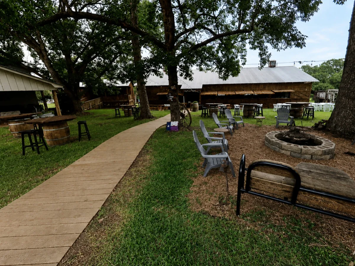 The fire pit commons under the oaks
