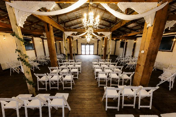 Chandeliers and timber in the barn