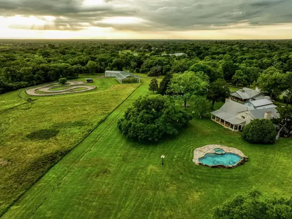 Aerial of the resort, pool, and go-kart track