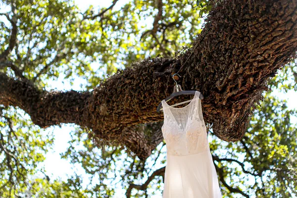 The bride stepping out of the bridal suite